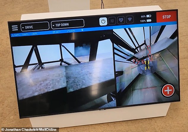 Rover's field of view is shared on a big screen as it successfully climbed up the stairs (before later falling down on the return journey)