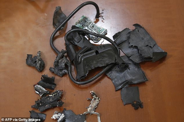 A photo taken on September 18, 2024, in Beirut's southern suburbs shows the remains of exploded pagers on display at an undisclosed location