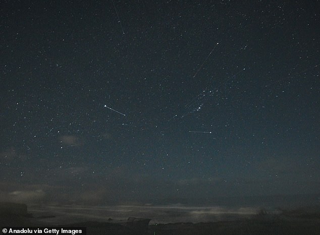 The Quadrantids Meteor Shower, pictured here over Half Moon Bay in California in 2024, will reach its dazzling peak this evening, with up to 80 meteors per hour lighting up the sky