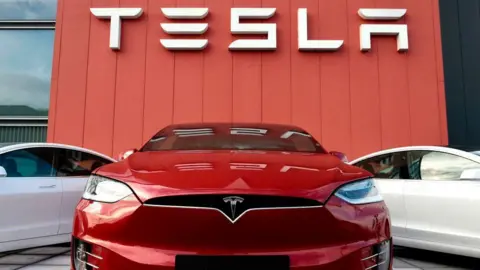 Getty Images Close up of a Tesla car