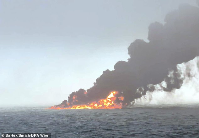 The oil spilt in today's collision (pictured) is likely to disperse quickly because it is volatile jet fuel. This means the environmental risk is lower than it would have been for a fuel like crude oil. However, the bigger concern is the toxic sodium cyanide which was being transported on the MV Solong