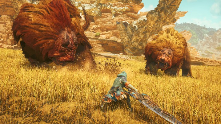 A hunter fights two monsters at once in Monster Hunter Wilds.