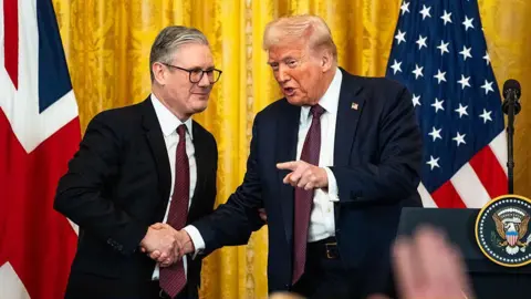Getty Images UK Prime Minister Sir Keir Starmer shaking hands with US President Donald Trump