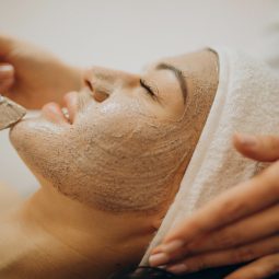 Woman visiting cosmetologist and making rejuvenation procedures