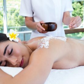 woman-enjoying-salt-scrub-massage-less woman-enjoying-salt-scrub-massage-less