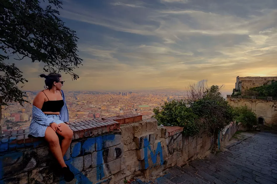 Woman enjoying the view Travel Photography by Estefano Onatrac | Naples
