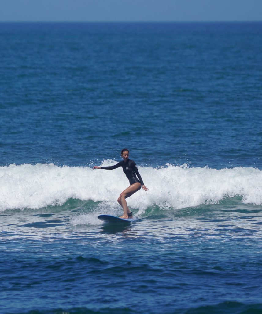 Beginner surfing at Batu Bolong Beach