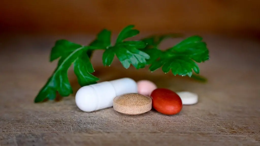 selection of pills with a green leaf