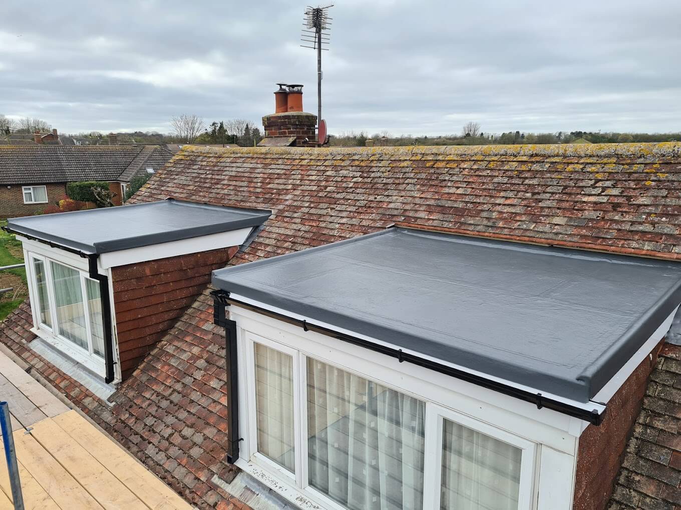 New Flat roof installed above windows