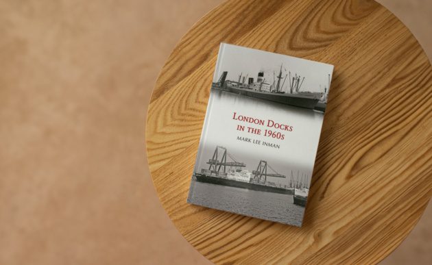 The London Docks in the 1960s book sitting on a table.
