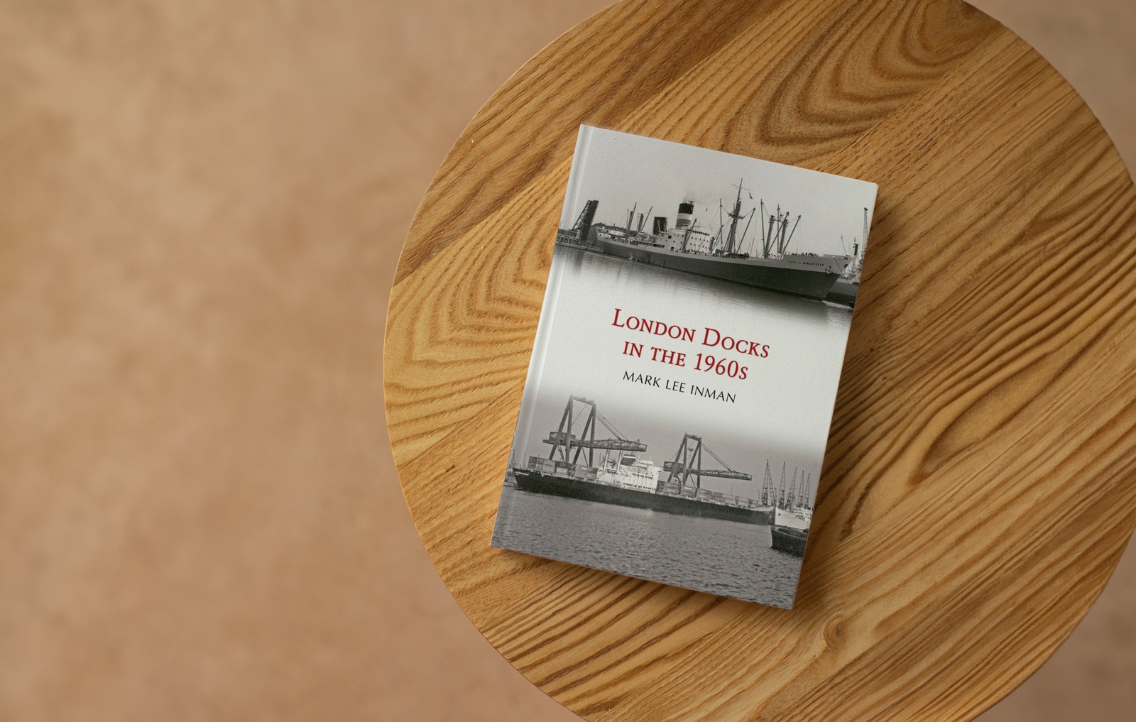 The London Docks in the 1960s book sitting on a table.