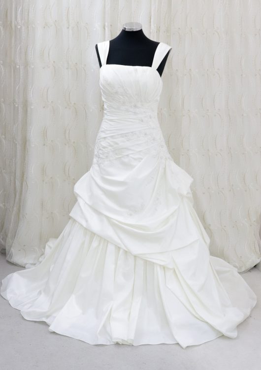 Beautiful white wedding dress with ruched side detail - pleated side with beads, stones and jewel - lace up back - south london wedding shop