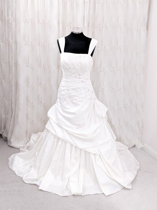 Beautiful white wedding dress with ruched side detail - pleated side with beads, stones and jewel - lace up back - south london wedding shop