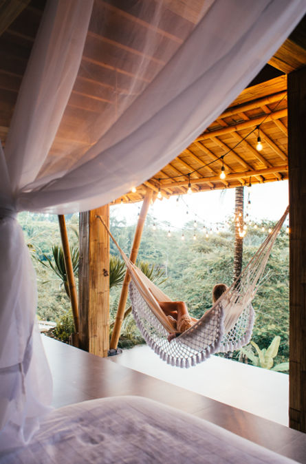 Woman in Thailand solo traveling relaxing enjoying the view of a jungle
