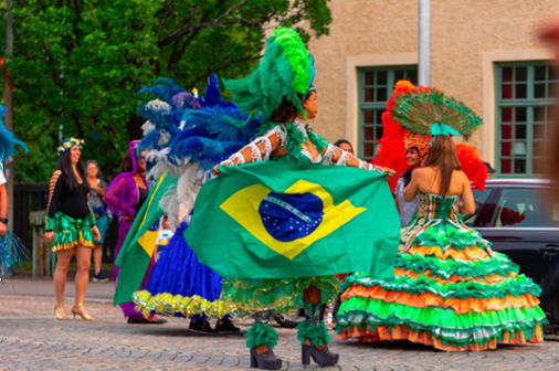 Brazil festival woman dancing with a flag