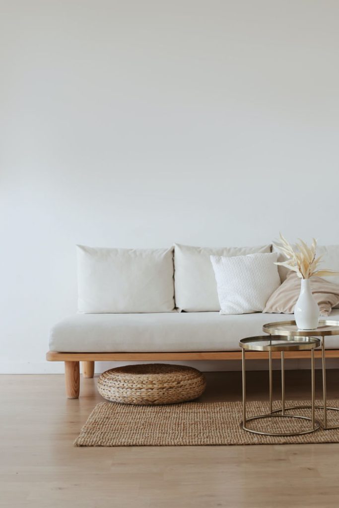 Minimalistic white couch with simple interior