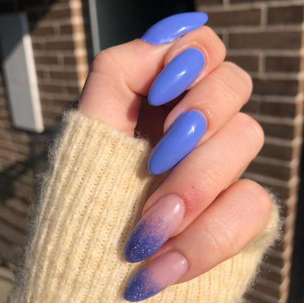 Blue and Purple Glitter Asymmetry for Weeding Guests: Mesmerizing blue and purple nails with an asymmetrical design.