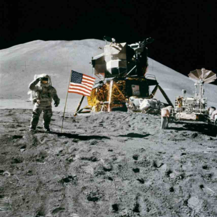 Astronaut in the moon with a United States flag. Showcasing Space Odissey 2001 Kubrick movie made into a book.