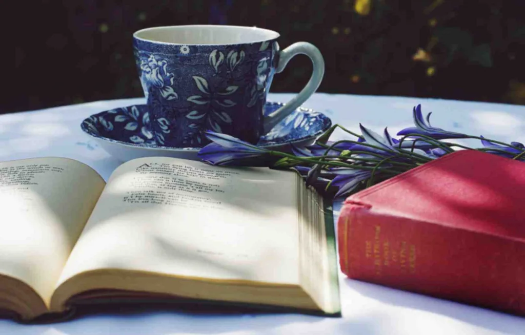 Book with blue mug showcasing best book 2024. Free to use Pexels image.