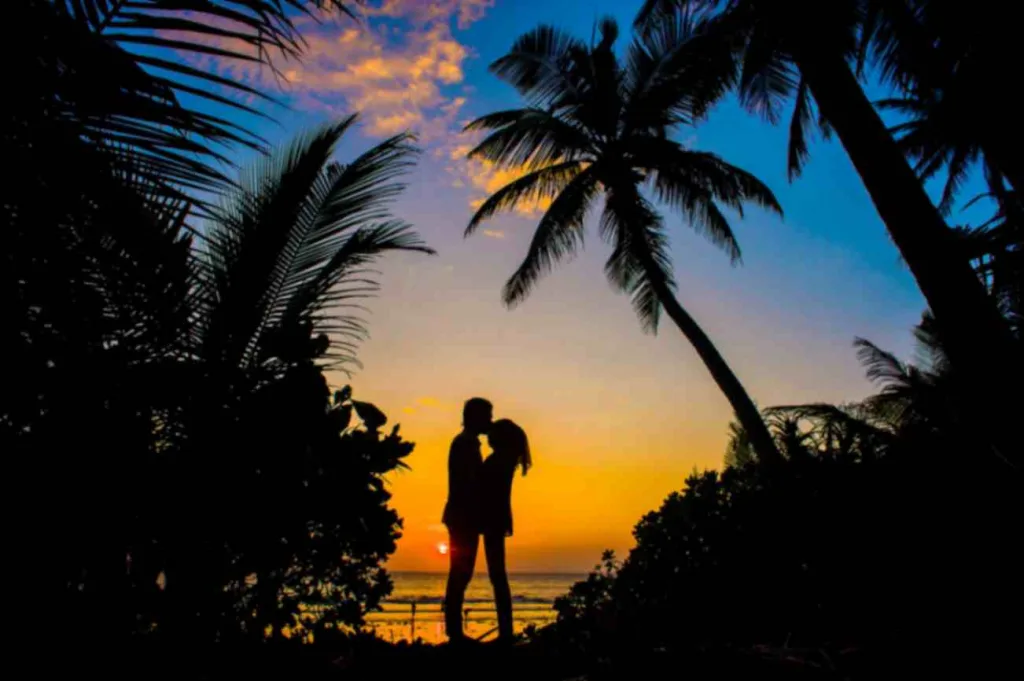 Couple in a beach during a sunset. Showcasing happy birthday wishes to your husband. 
