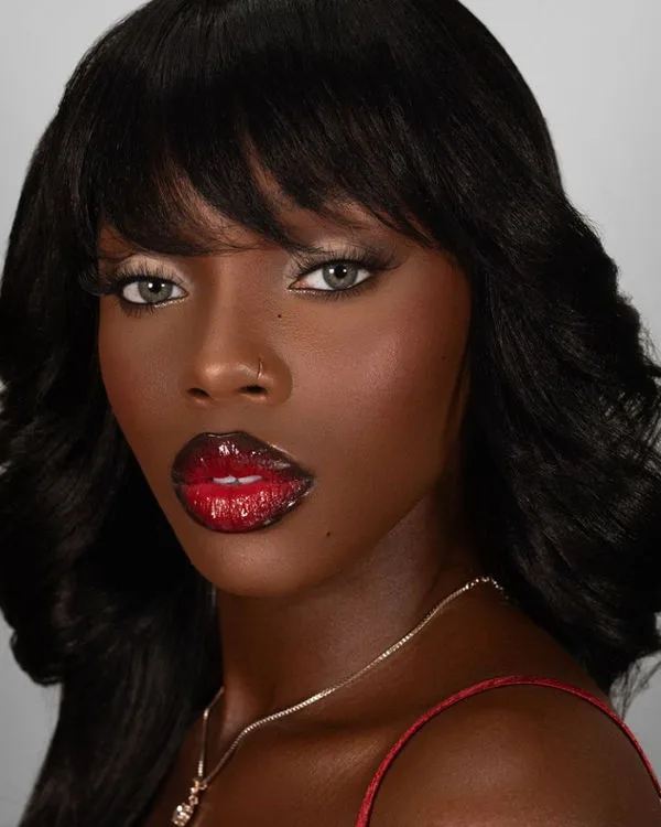 Picture of girl showing the beauty industry trend 2024, cherry cola lips