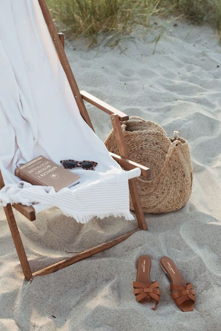 beach chair and beach accessories for a beach day