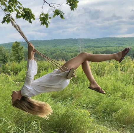 happy girl on a swing