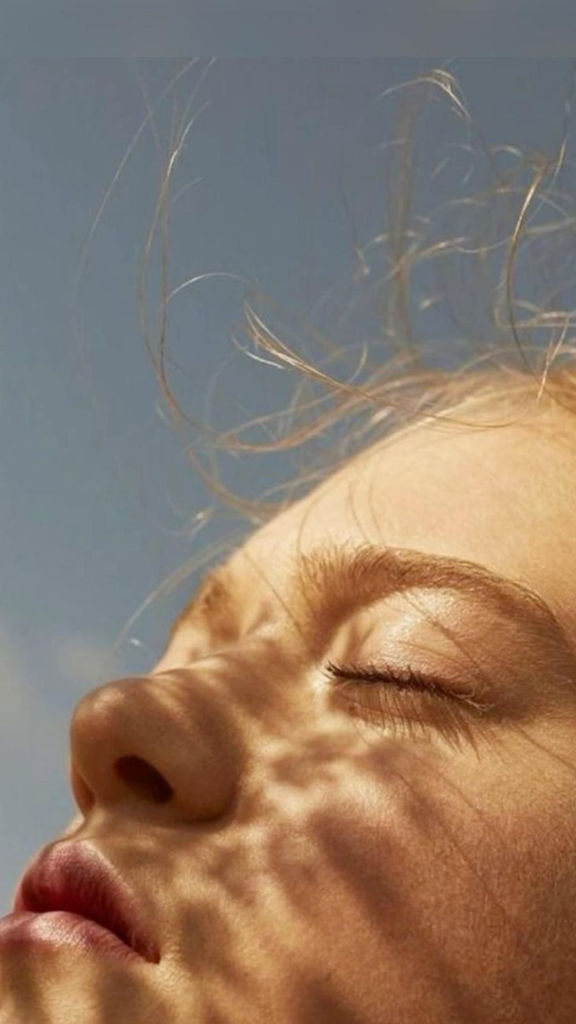 girl taking in sunlight as vitamin d supplement