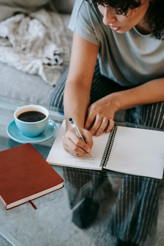 woman making a staycation guide plans