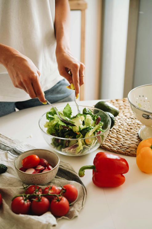 woman making a salad