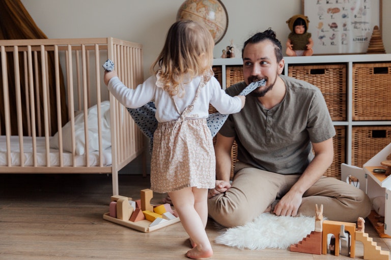 dad and daughter playing