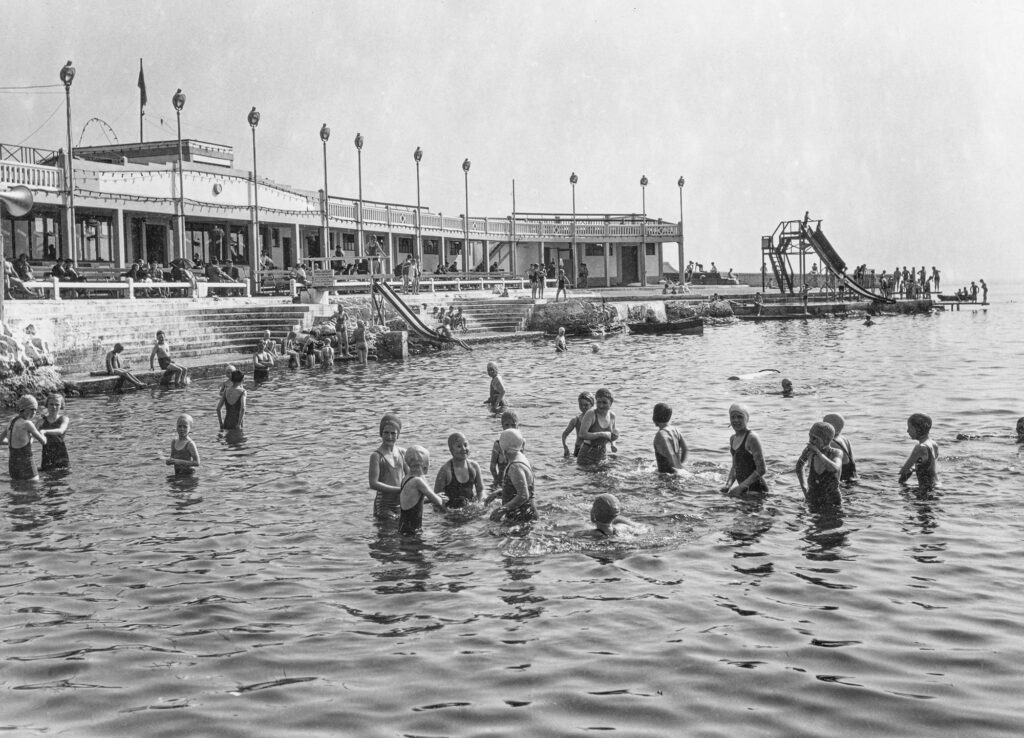 A busy day at the Saltpans Bathing Place around 1940. A busy day at the Saltpans Bathing Place around 1940. The outdoor lights are visible here after not being present in the photos above.