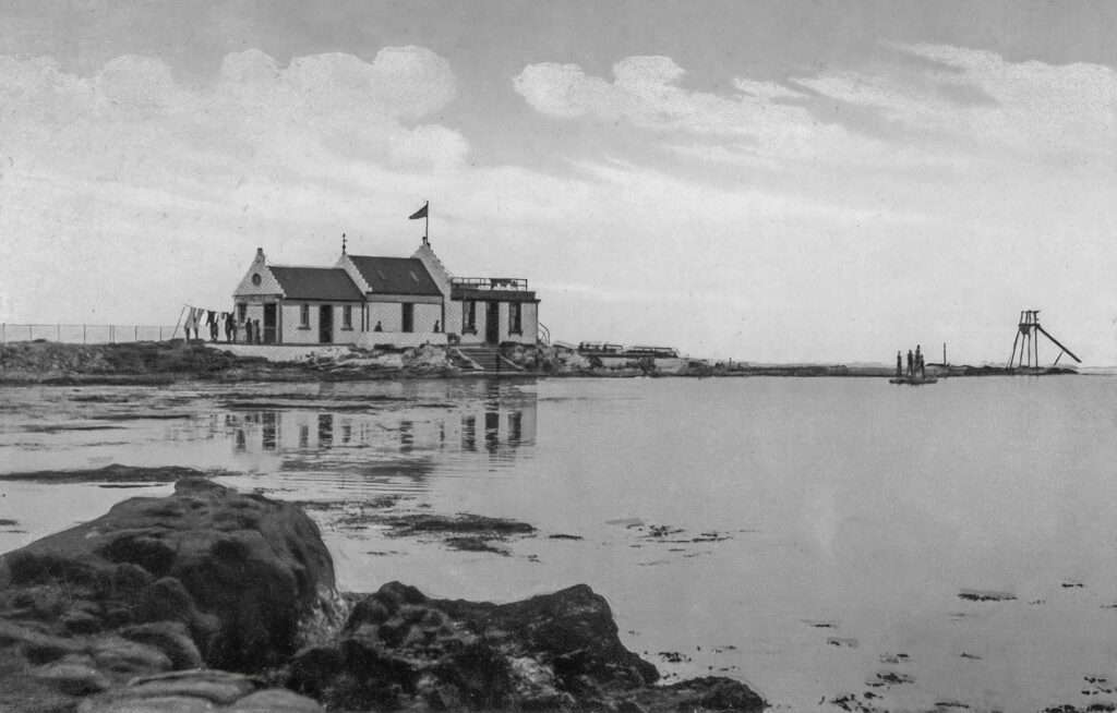 The bathing station around 1909, showing the Bathing Club's pavilion on the right of the original building, and . Photo from an old postcard by Valentine & Sons.