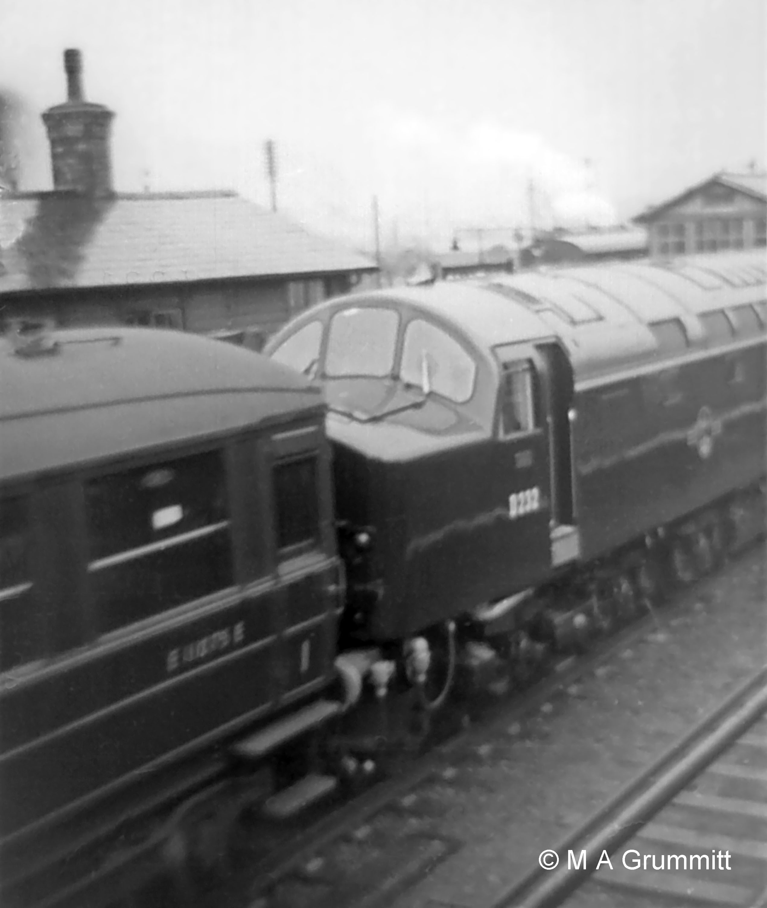 Much cleaner! The new order, in the shape of gleaming English Electric Type 4 (later Class 40) No. D232, passes northbound brand new on a trial run. These locomotives were not poular on the East Coast Main Line because of poor relibility. D232 spent nearly all its working life on the West Coast Main Line, carrying the name Empress of Canada after the Canadian Pacific liner which sailed regularly out of Liverpool. Photograph by Mick Grummitt