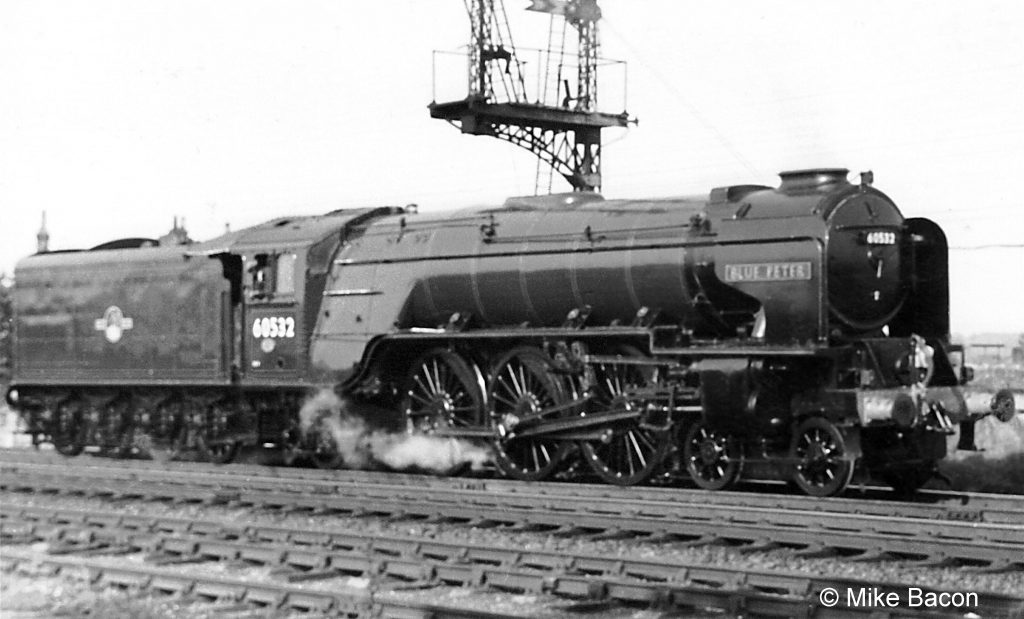 Class A2 No. 60532 Blue Peter was based at Aberdeen, so it was a very rare sight in the Grantham area, usually only seen when on trial from Doncaster Works to Barkston Junction. Here it is near Barkston station (point 'B' on the plan), in reverse gear, preparing to take the Sleaford line as far as Barkston East Junction. No. 60532 re-entered service on 28th August 1958 following a Heavy Intermediate repair at Doncaster, so Mike's photograph may have been taken a day or so earlier. Photograph by Mike Bacon.