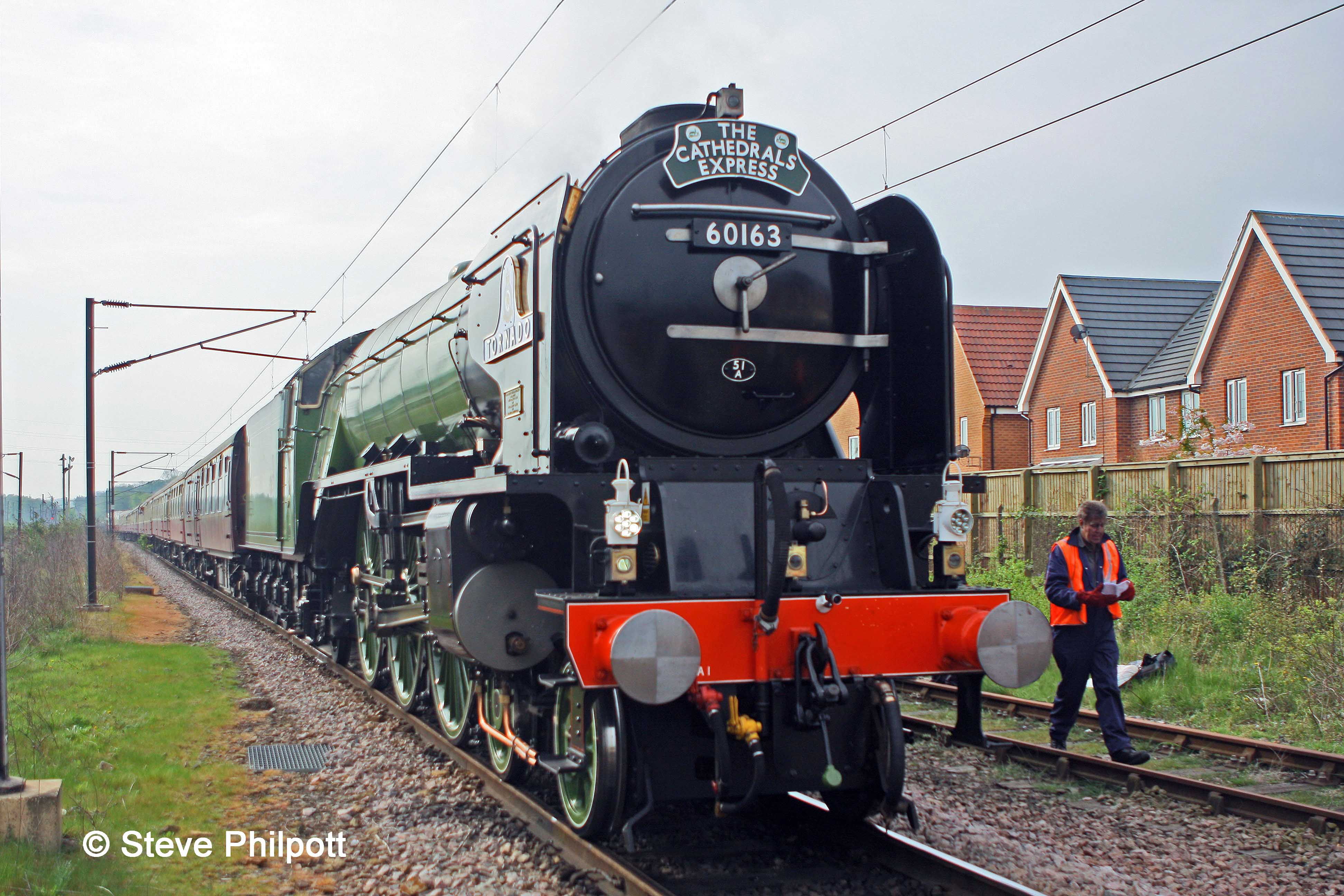 Jeremy Clarkson walks past Tornado in Grantham Down Yard during the booked water stop.