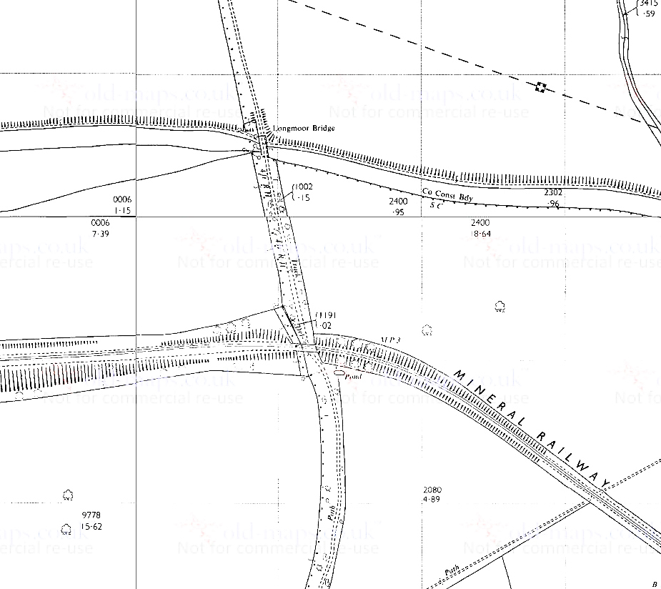 The railway is a short distance south of the canal as they both cross Longmoor Lane, the lane passing over the canal but under the railway.