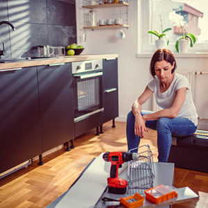 woman sitting on a box