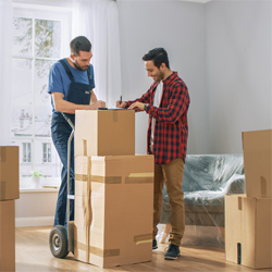 two men with moving boxes
