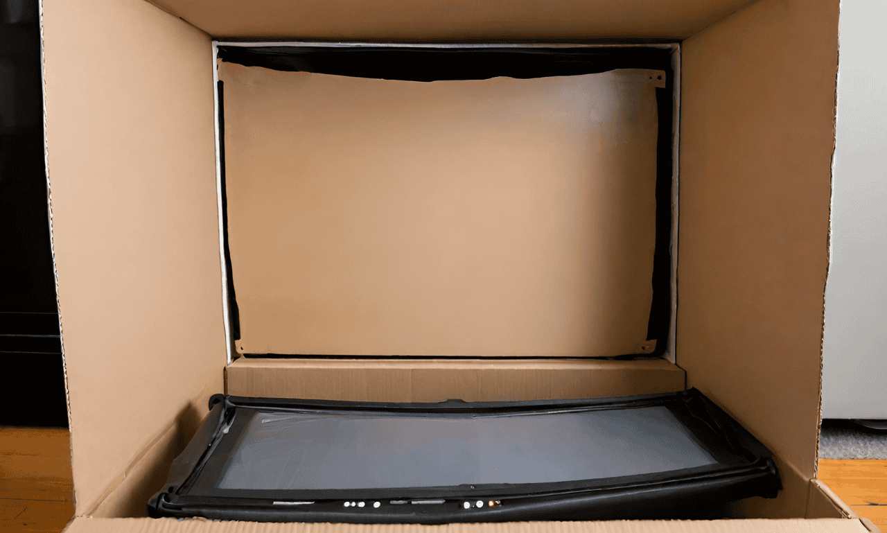 Can You Transport a TV Laying Down in the Box? The Risks and How to