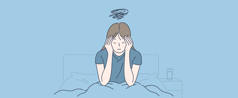 Blåt lys eksponering - En kvinde har søvnproblemer på grund af megen blåt lys eksponering
