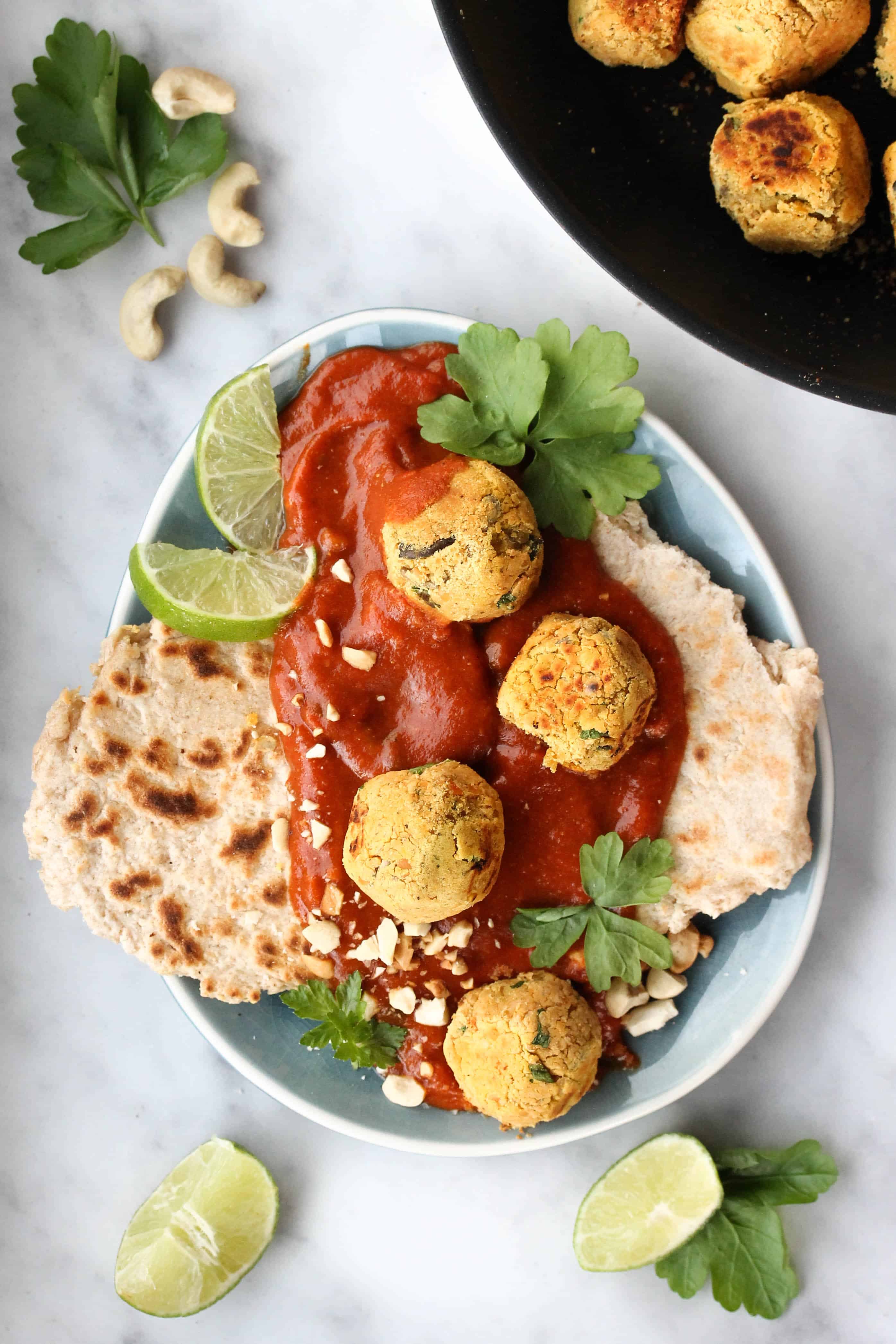 Lentil Curry Balls with a creamy Tomato Curry Coconut Sauce