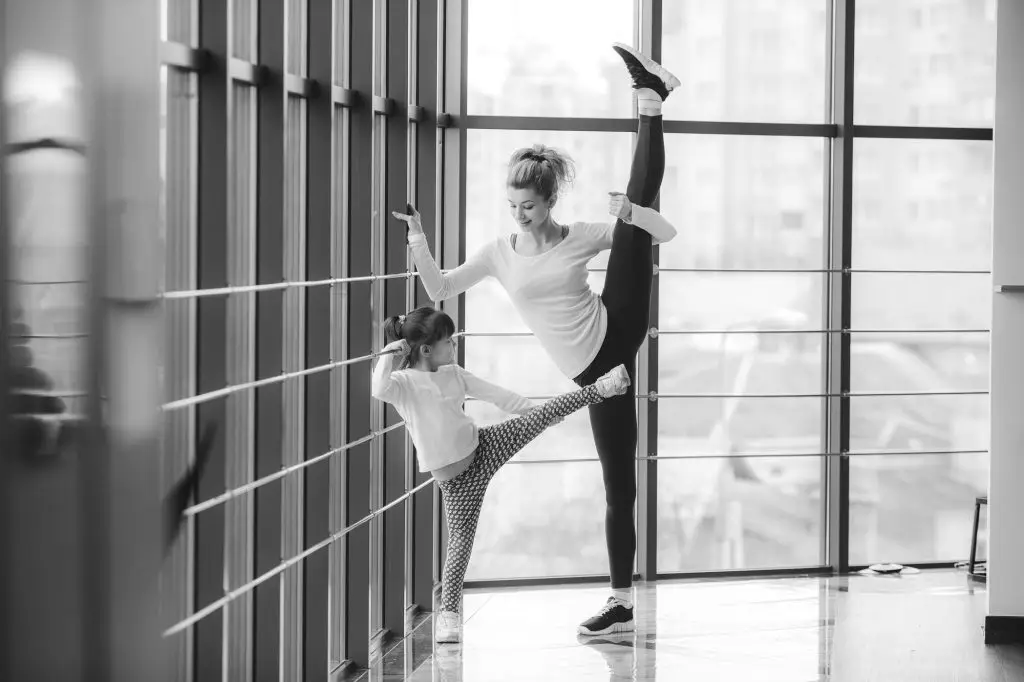 Charming family spends time in the gym