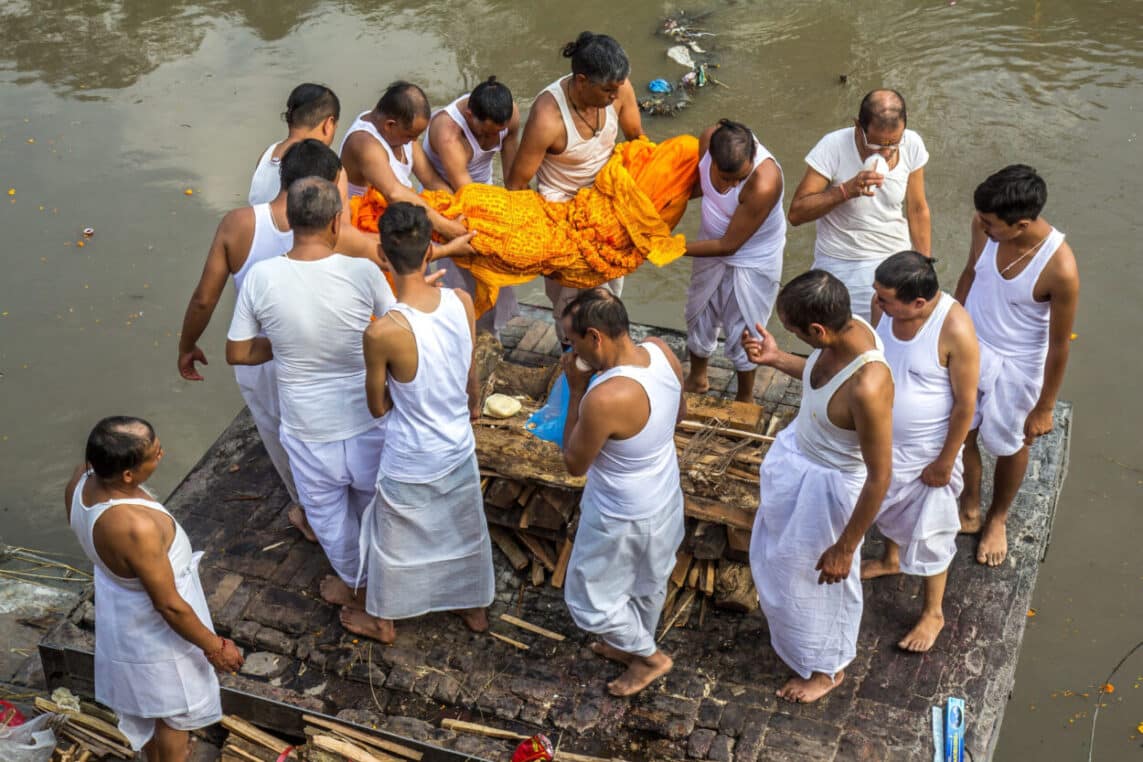 Hindu Funeral tradition for mourners to dress in white.