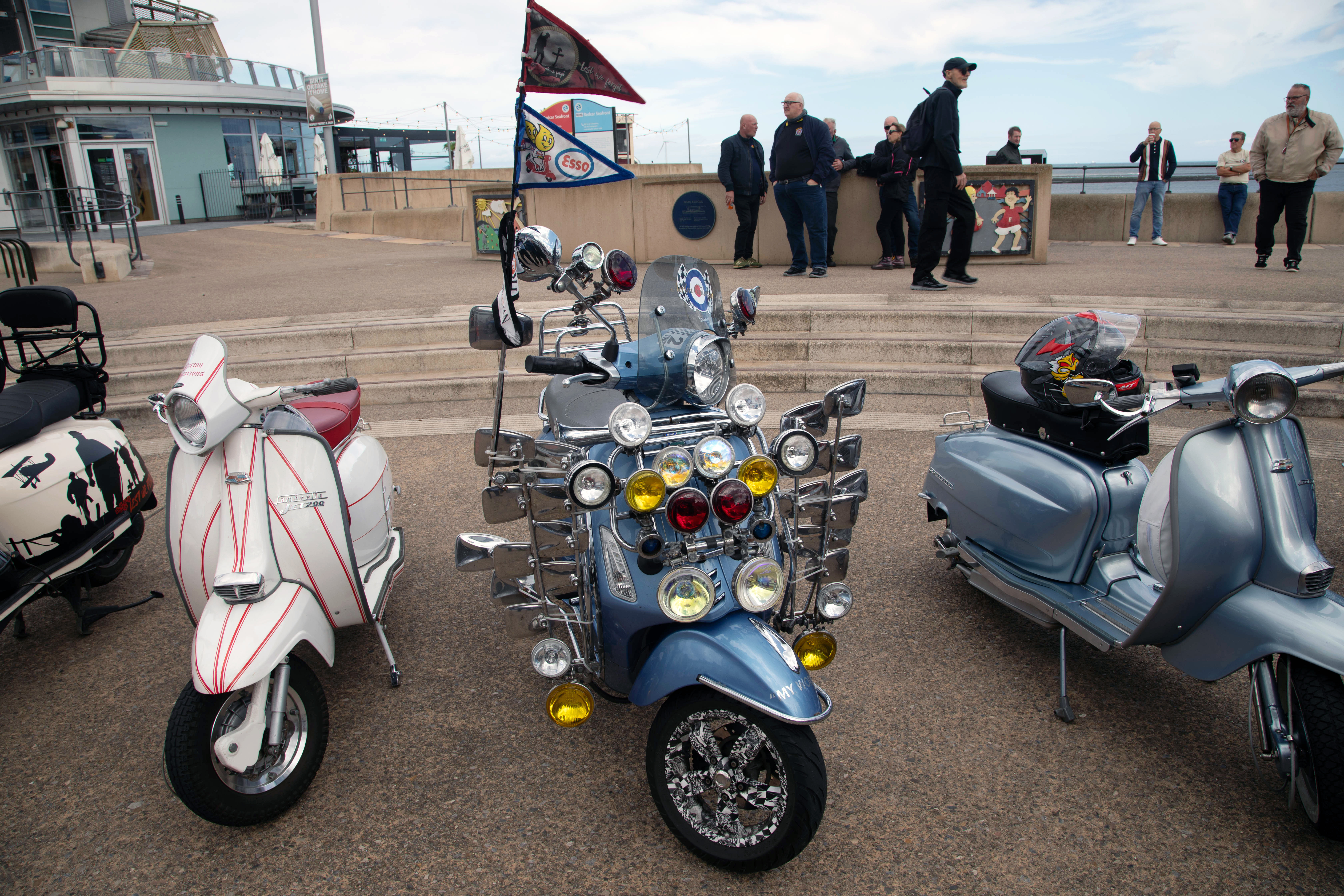 Editorial use only: Scooters at a scooter club meeting card on Redcar seafront on 19-Aug-2023. Lambrettas, Vespas, Lexmoto, and others 1 scooter 4