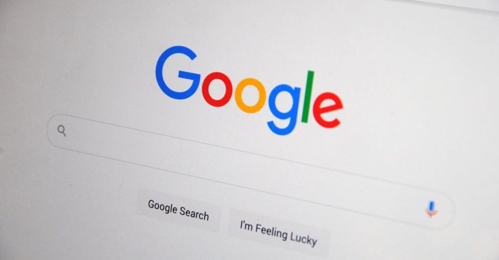 Close-up of the Google homepage on a screen showing search options.