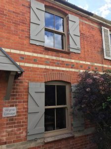 brown sliding sash window