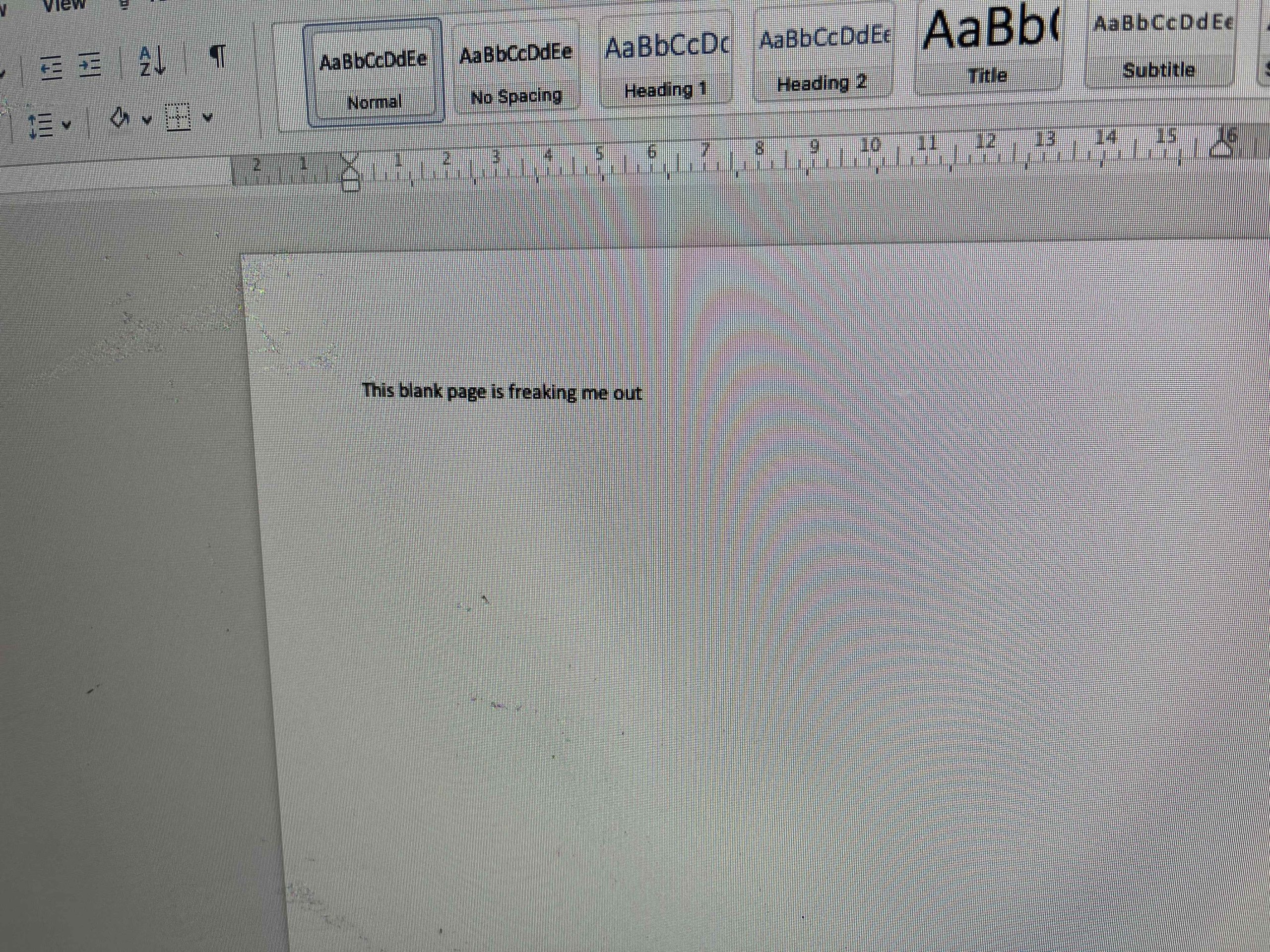 A page in a word processor. It reads: 'This blank page is freaking me out'