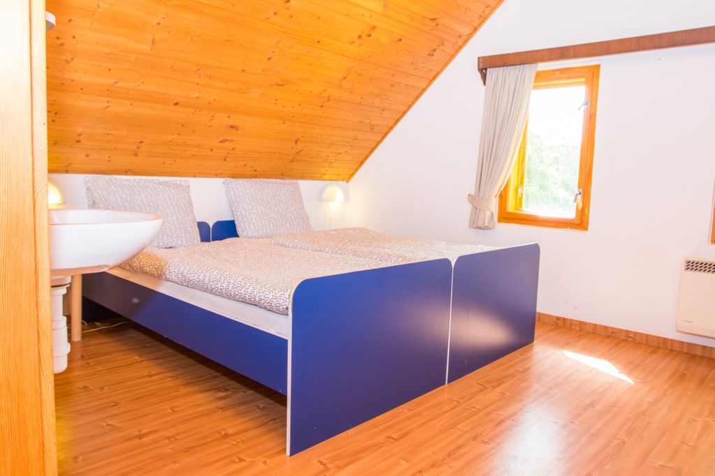 Slaapkamer in vakantiehuis in Tsjechië