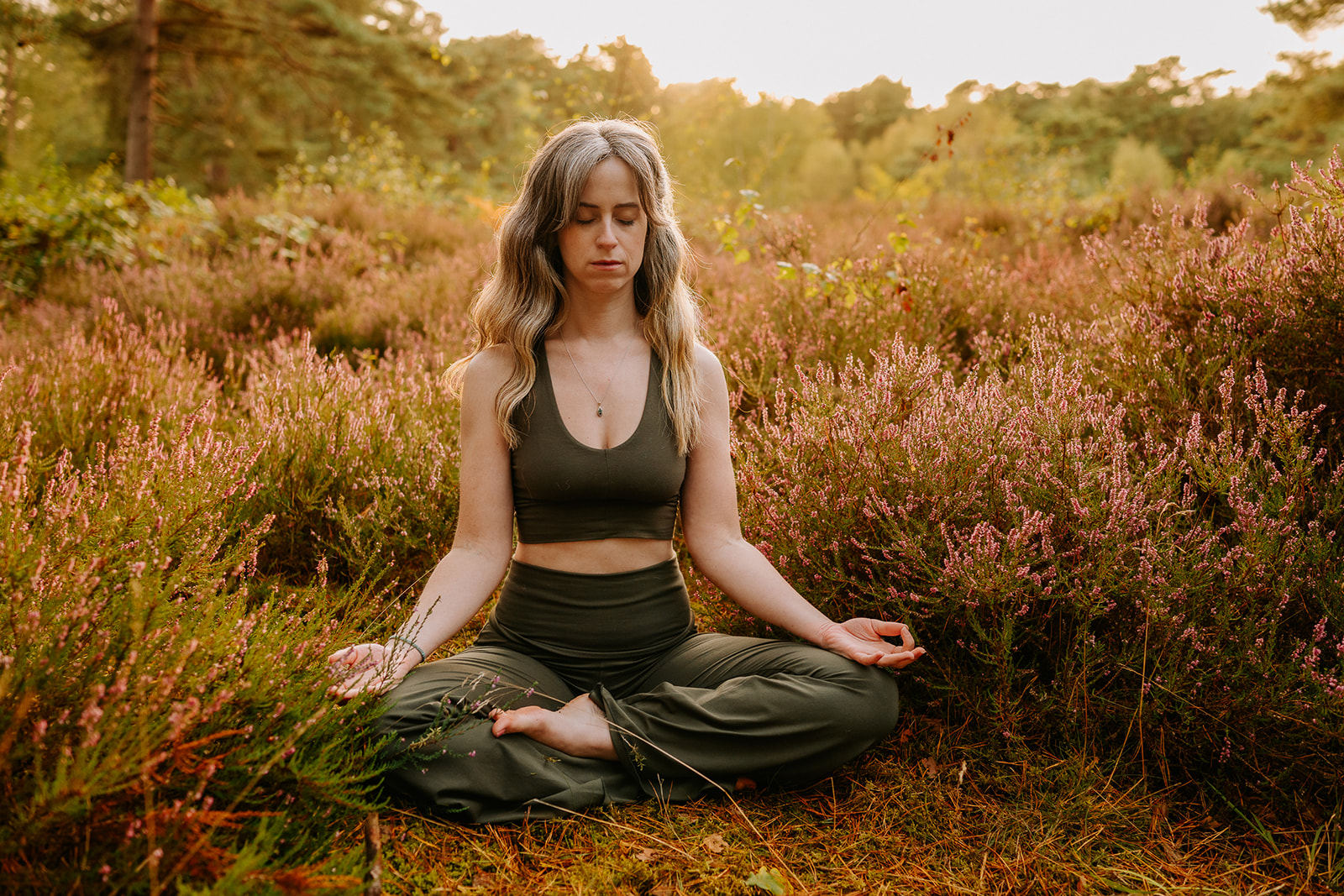Women meditating at sunset in Horsham, during a branding photo session outdoors